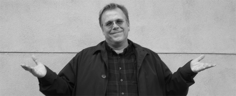 Fred Holliss in front of a wall